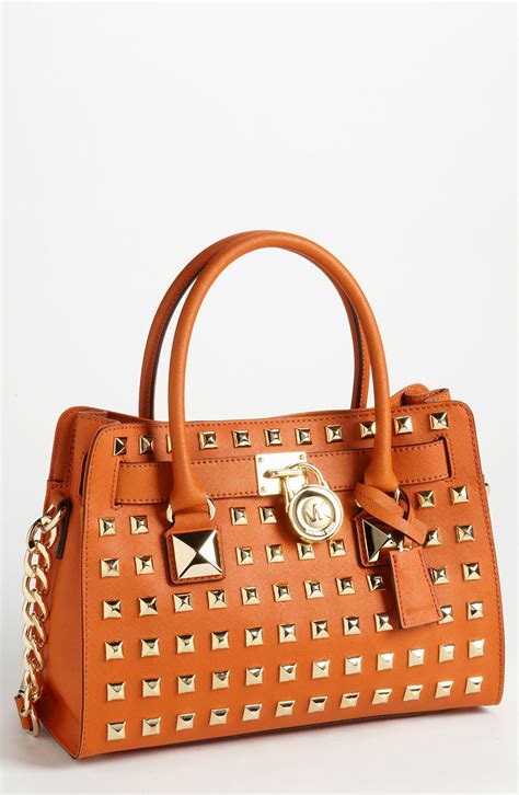 michael kors orange studded purse|Michael Kors orange bag.